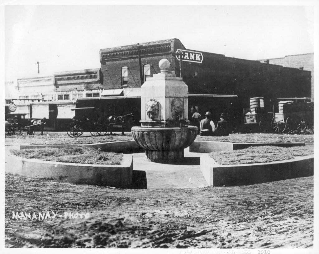Lion Heads decorating the mineral well in downtown Arlington, TX, 1910-17.