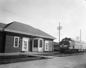 Texas & Pacific train station with locomotive on the tracks