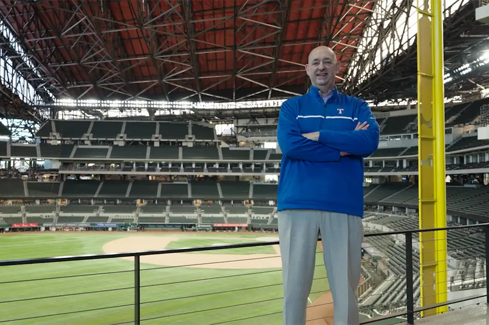 Rob Matwick stands near foul pole at Globe Life Field.