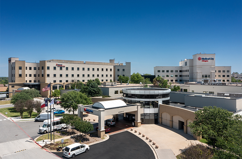 Aerial exterior of Medical City Arlington on sunny day.