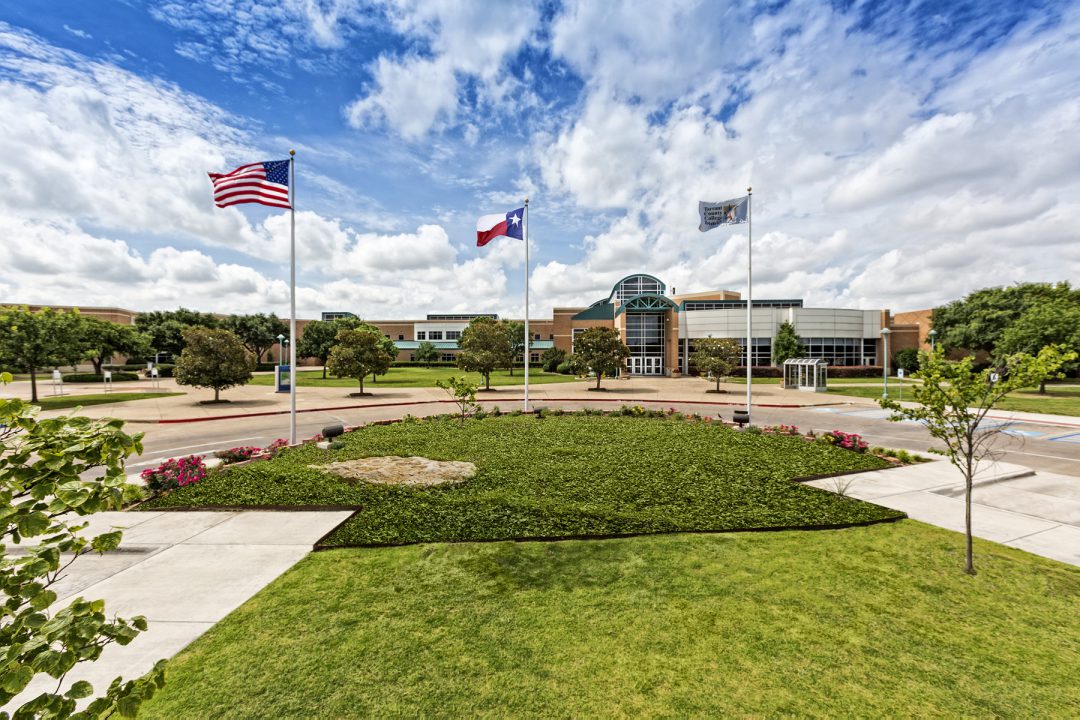 Exterior ground view of main building at Tarrant County College Southeast Campus.