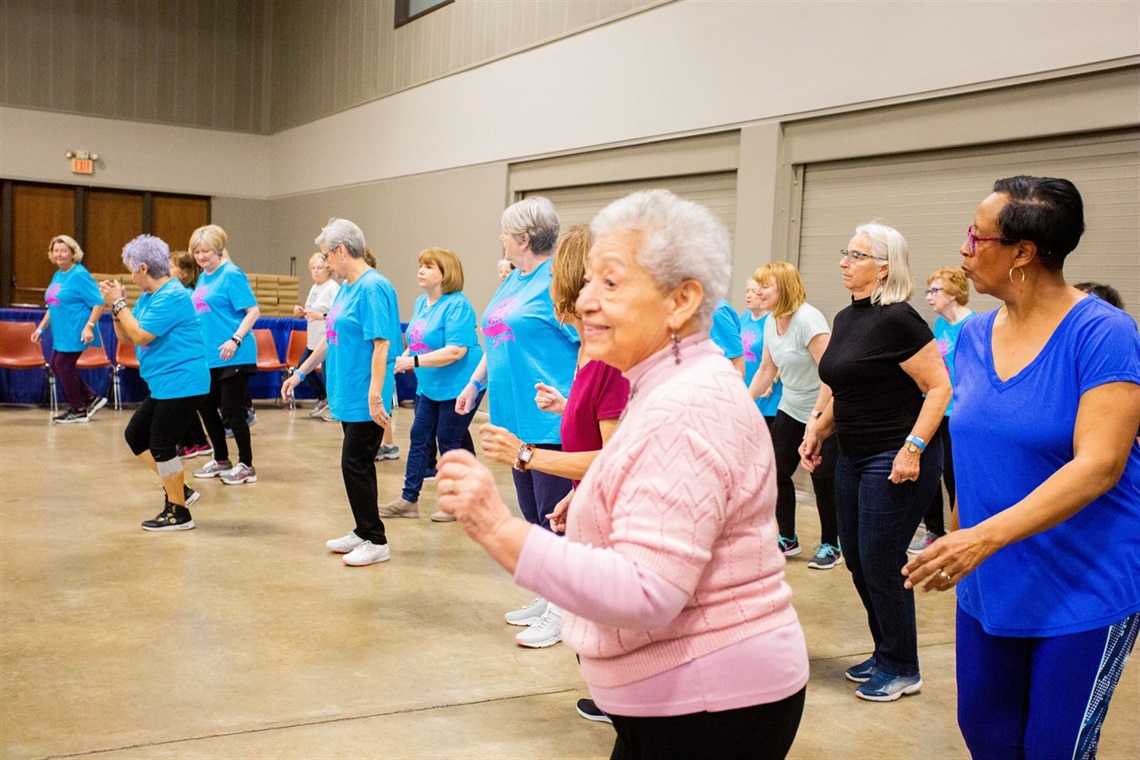 Attendees dancing at the City of Arlington's Aging Well Expo.