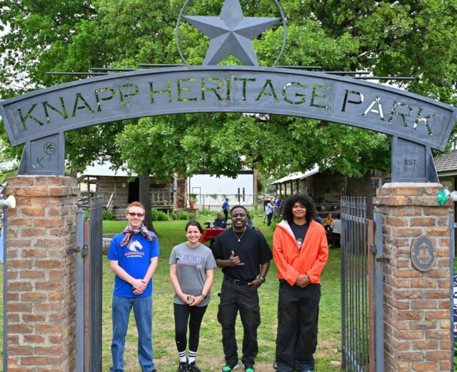What a fun morning at Knapp Heritage Parks Pioneer Day! Butter making, cornhusk dolls and hands on history made for an unforgettable day thanks to UTA Museum Studies and History students, the Arlington Historical Society and Fielder Museum. Want more sesquicentennial fun? Head to Arlington150.com. 

The heritage site in Downtown Arlington serves as a rustic throwback to the city’s roots. The park contains three of Arlington’s oldest structures: the P. A. Watson Log House (1855), originally built by early settler and community leader Patrick Alfred Watson for his family; the Jopling-Melear Cabin (1863), a one-room frontier home constructed by farmer and cattleman George Washington Jopling; and the North Side School (1909), a temporary schoolhouse built after a fire destroyed the original campus. #arlington150